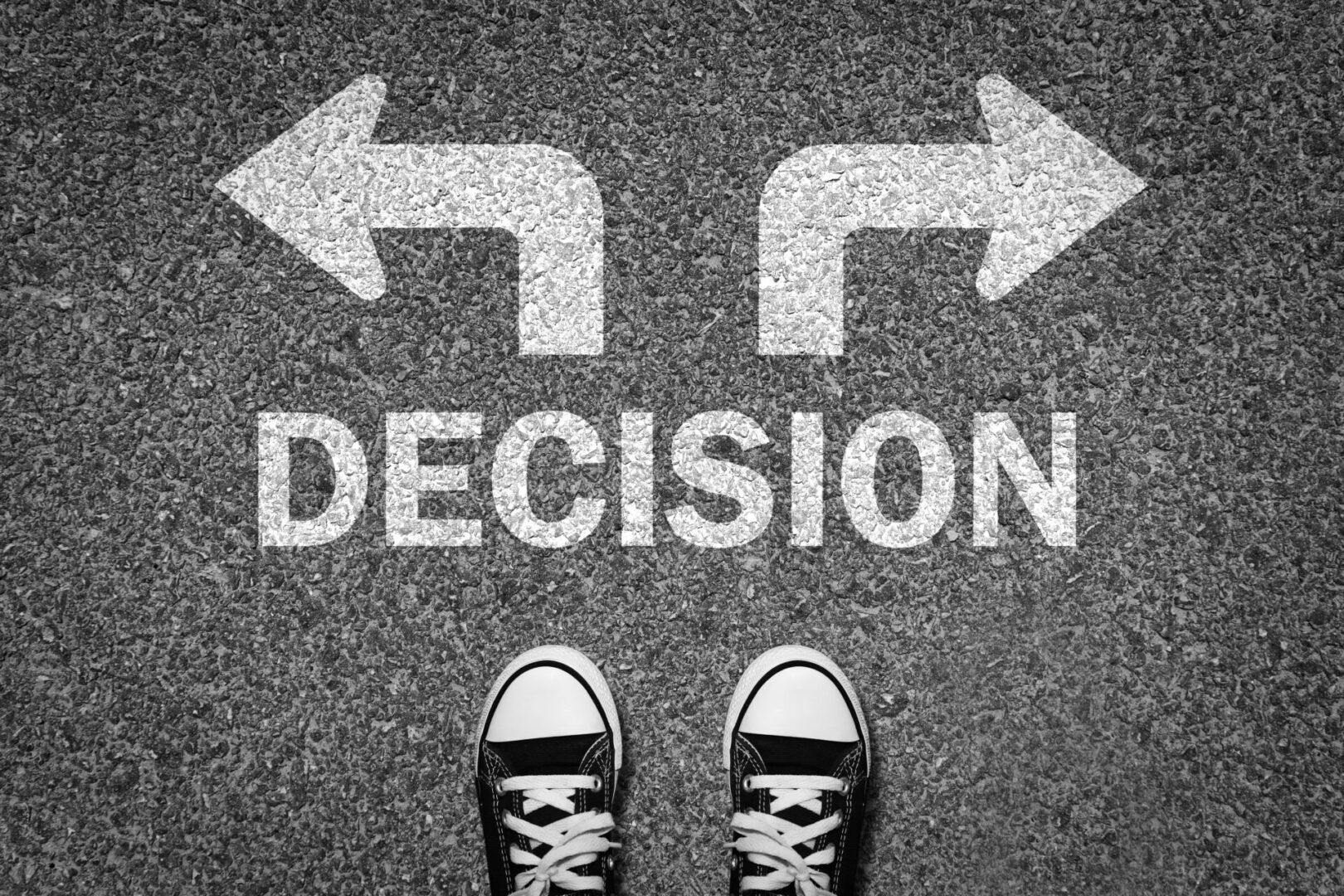 Shoes standing at a crossroads with arrows pointing left and right labeled 'DECISION'.